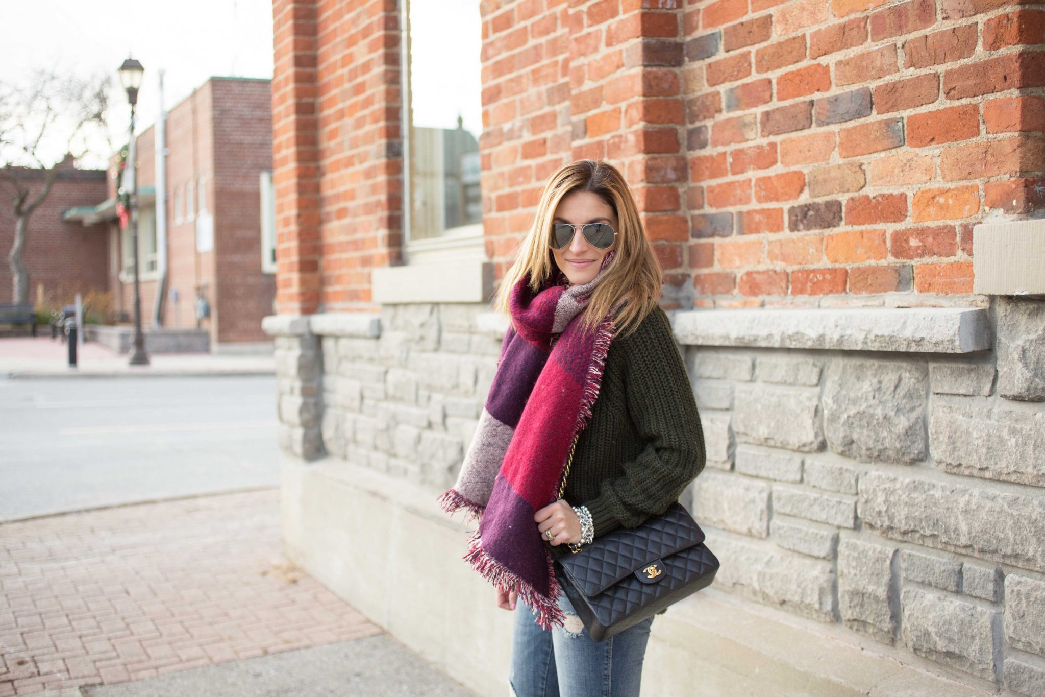 Oversized scarf with cable-knit sweater distressed jeans and Chanel bag sparkleshinylove