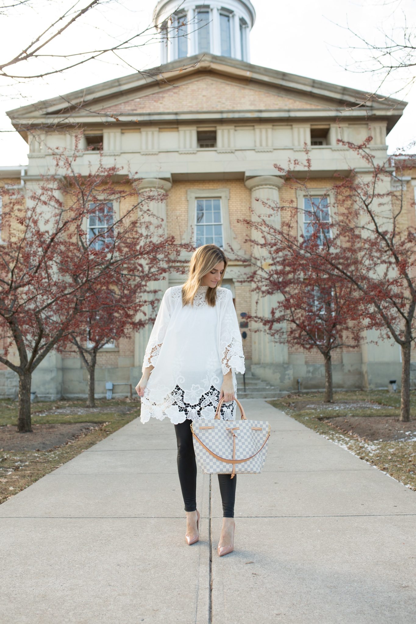 White Tunic with cut out detail, pleather leggings, nude Christian Louboutin heels, Louis Vuitton Girloata Bag