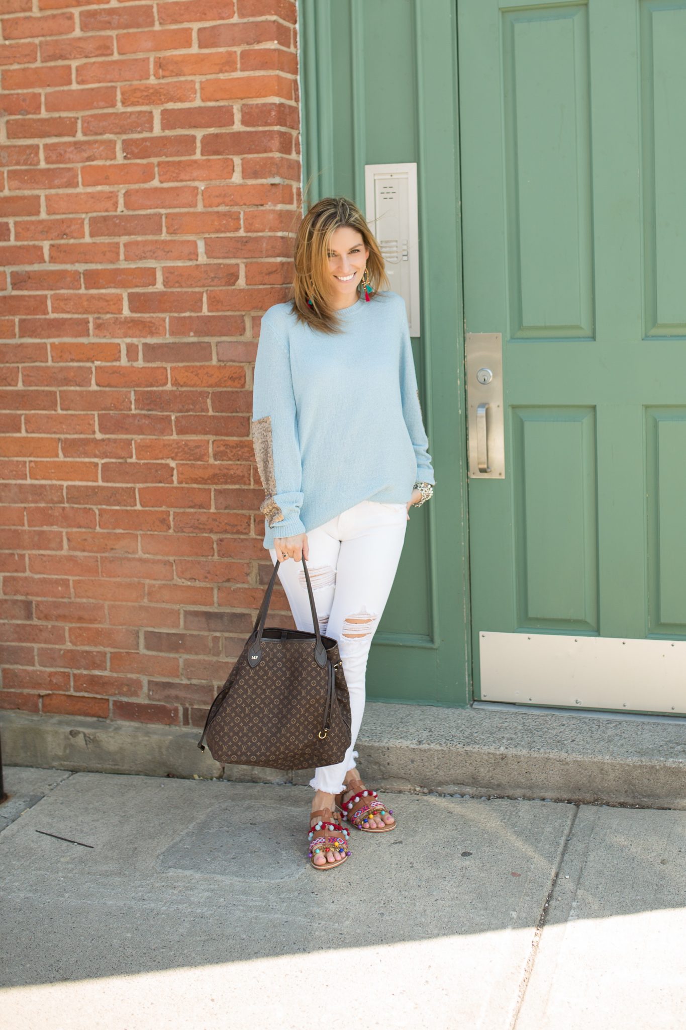Pink Blush Light Blue Sequin Accent Sleeve Knit Sweater, white distressed jeans from Jean Machine, Charlotte Tassel and Pom pom sandals, Louis Vuitton Neverfull