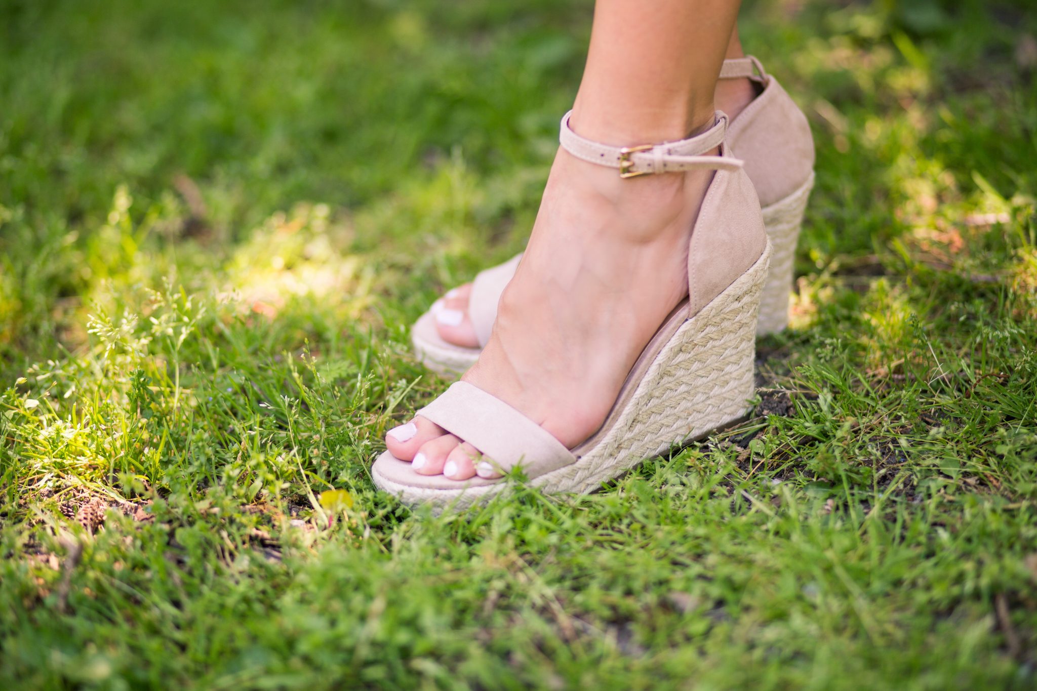 Pink clutch and wedge sandals from Le Chateau
