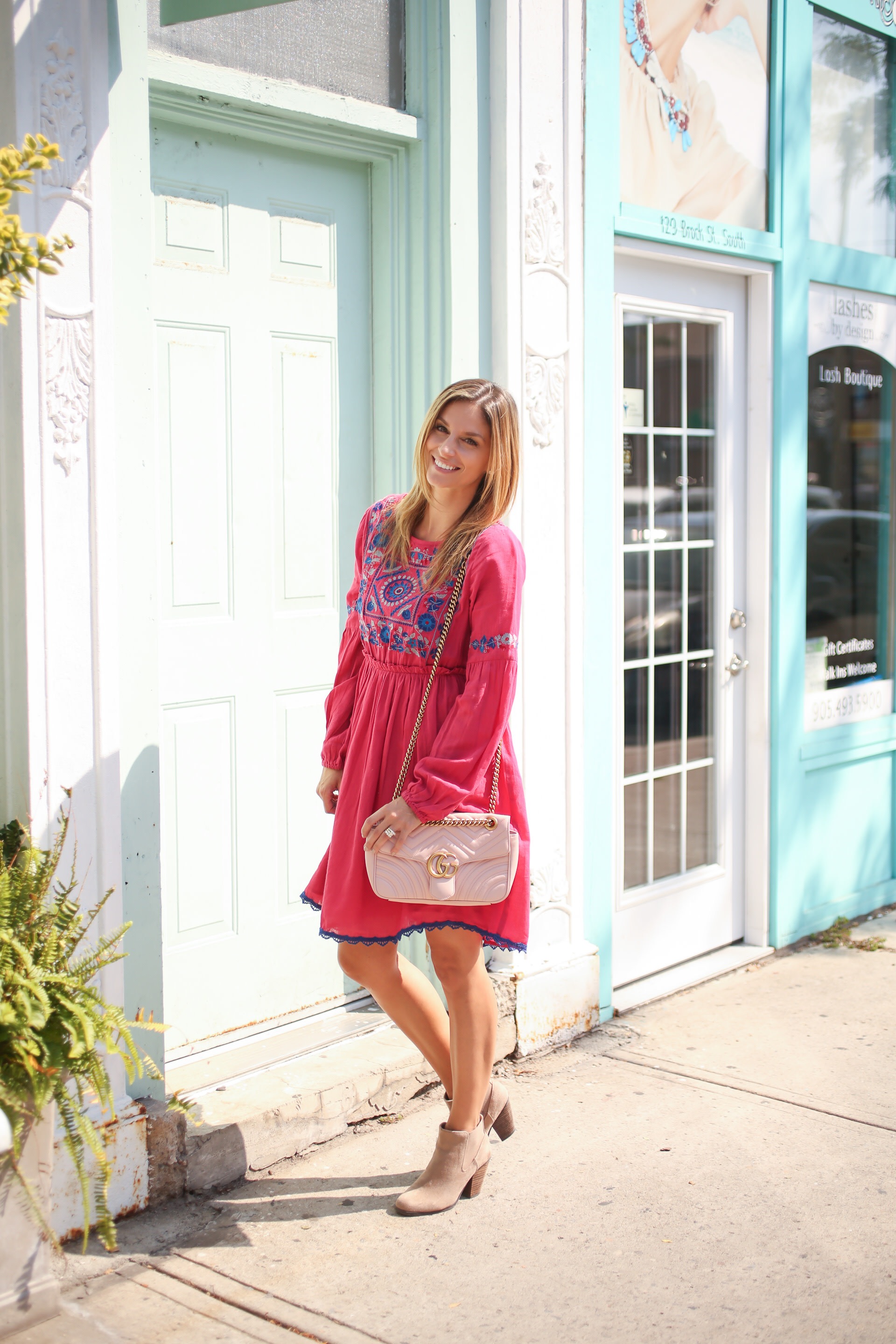 Pink embroidered peasant dress with suede booties and pink Gucci bag