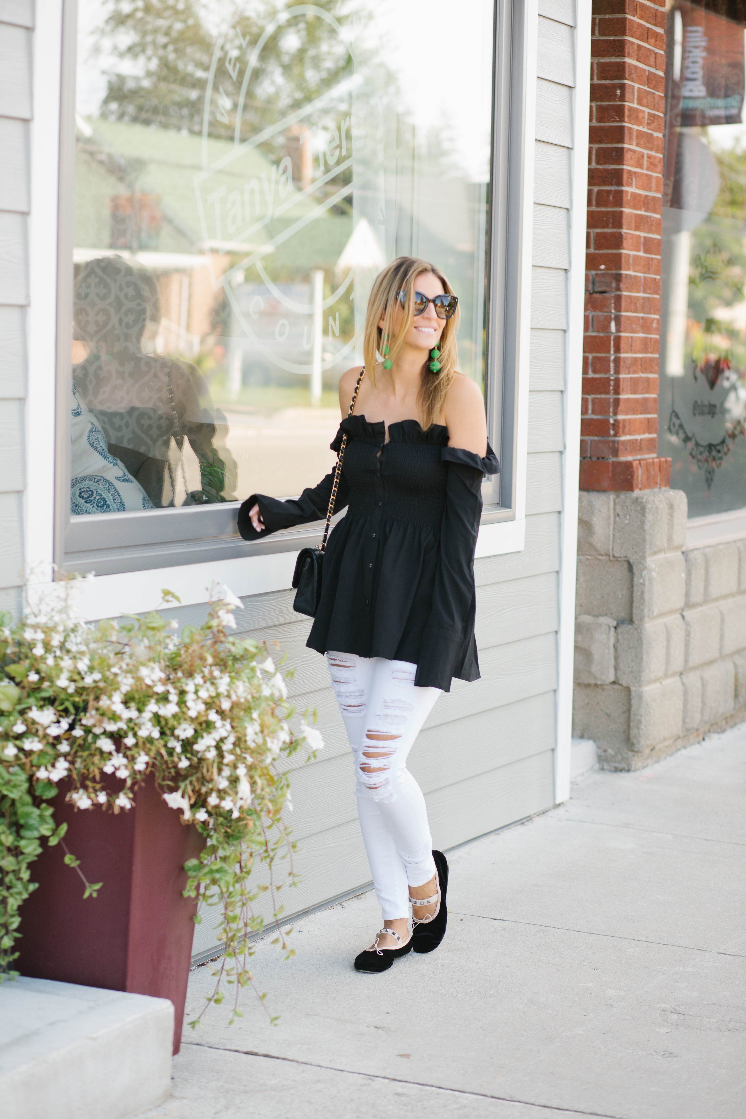 Fall look with off the shoulder top and white jeans
