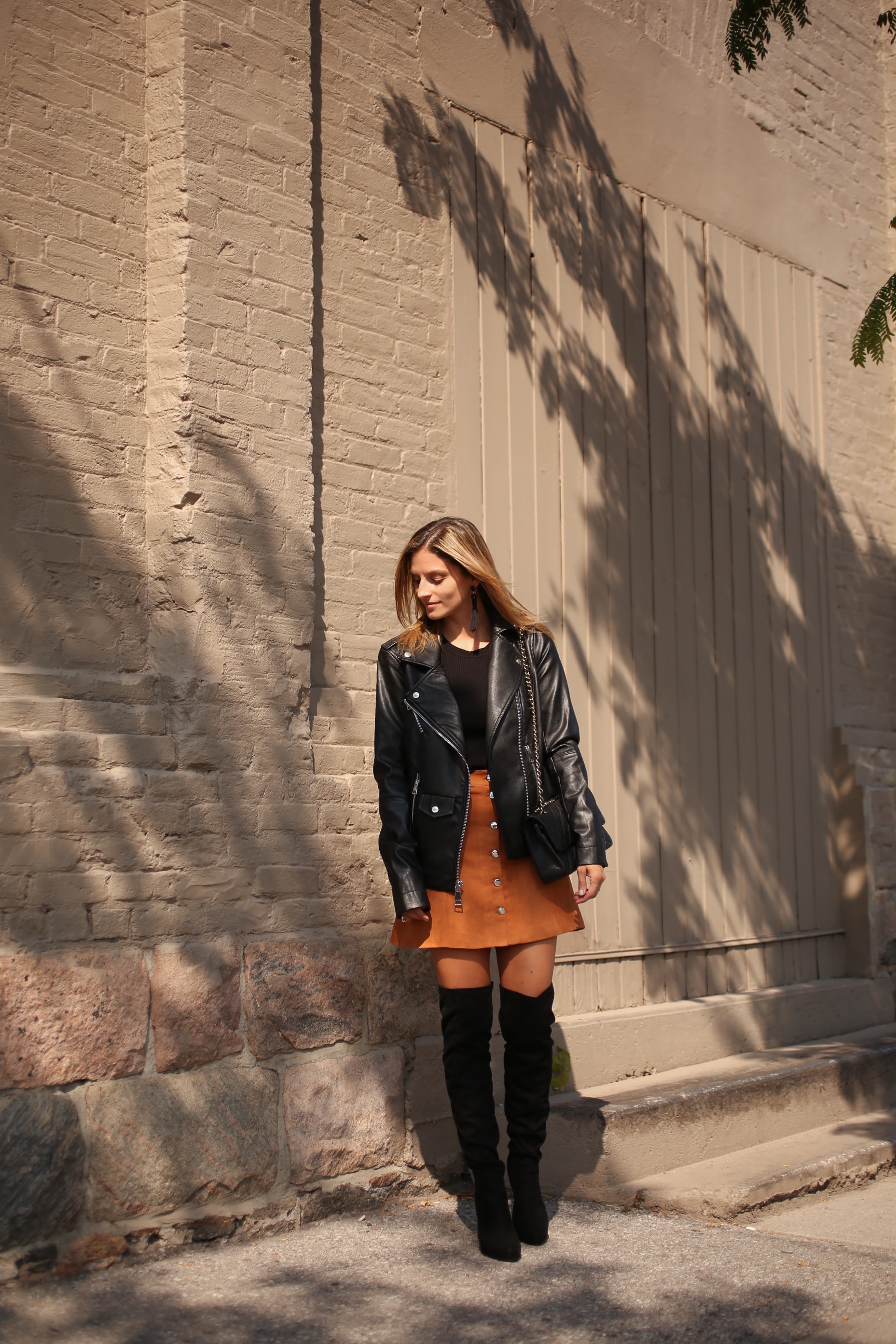 leather jacket and suede skirt