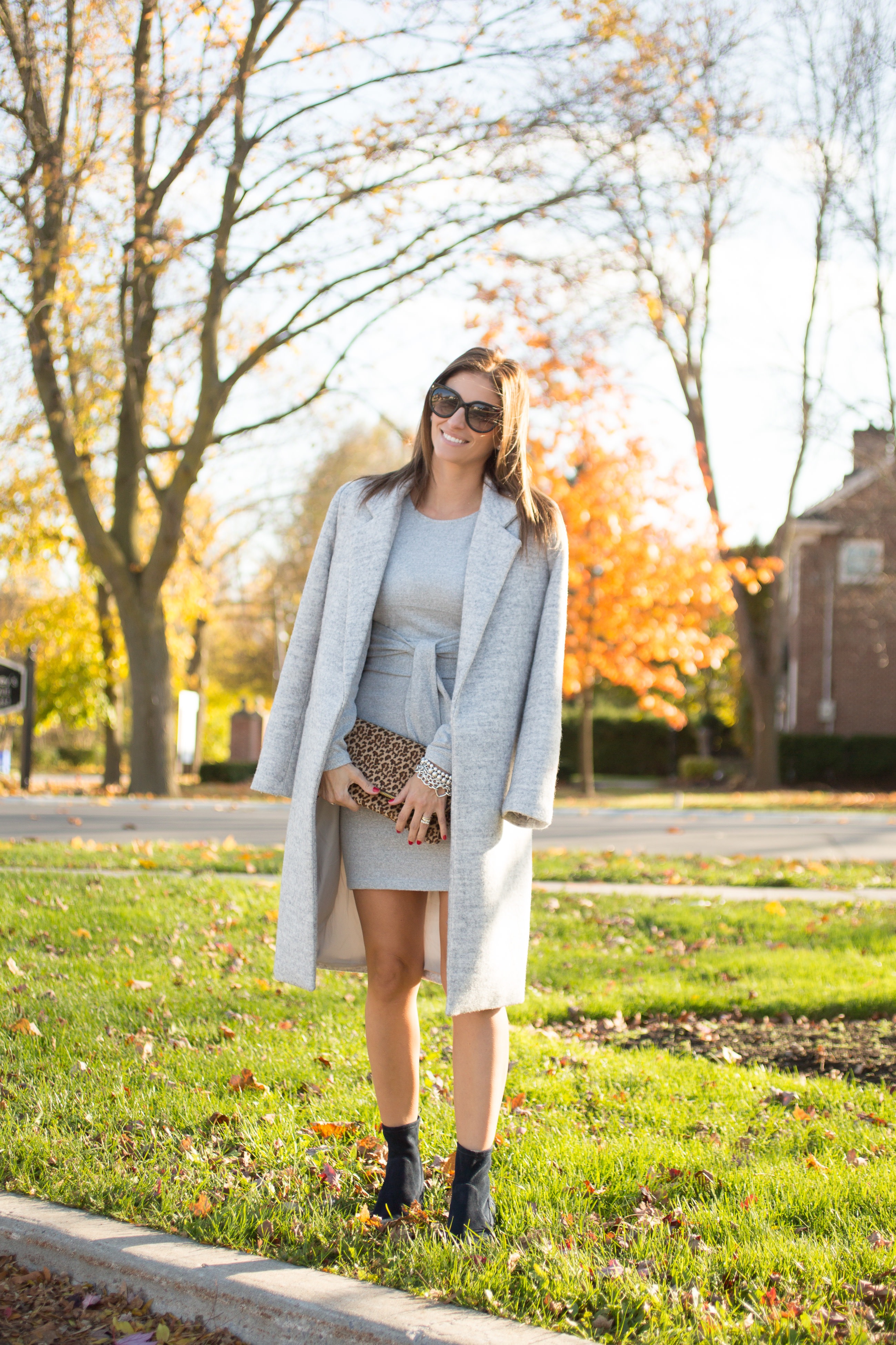 Grey sweater dress from Dynamite, grey long coat, leopard bag, black pointed toe sock boots