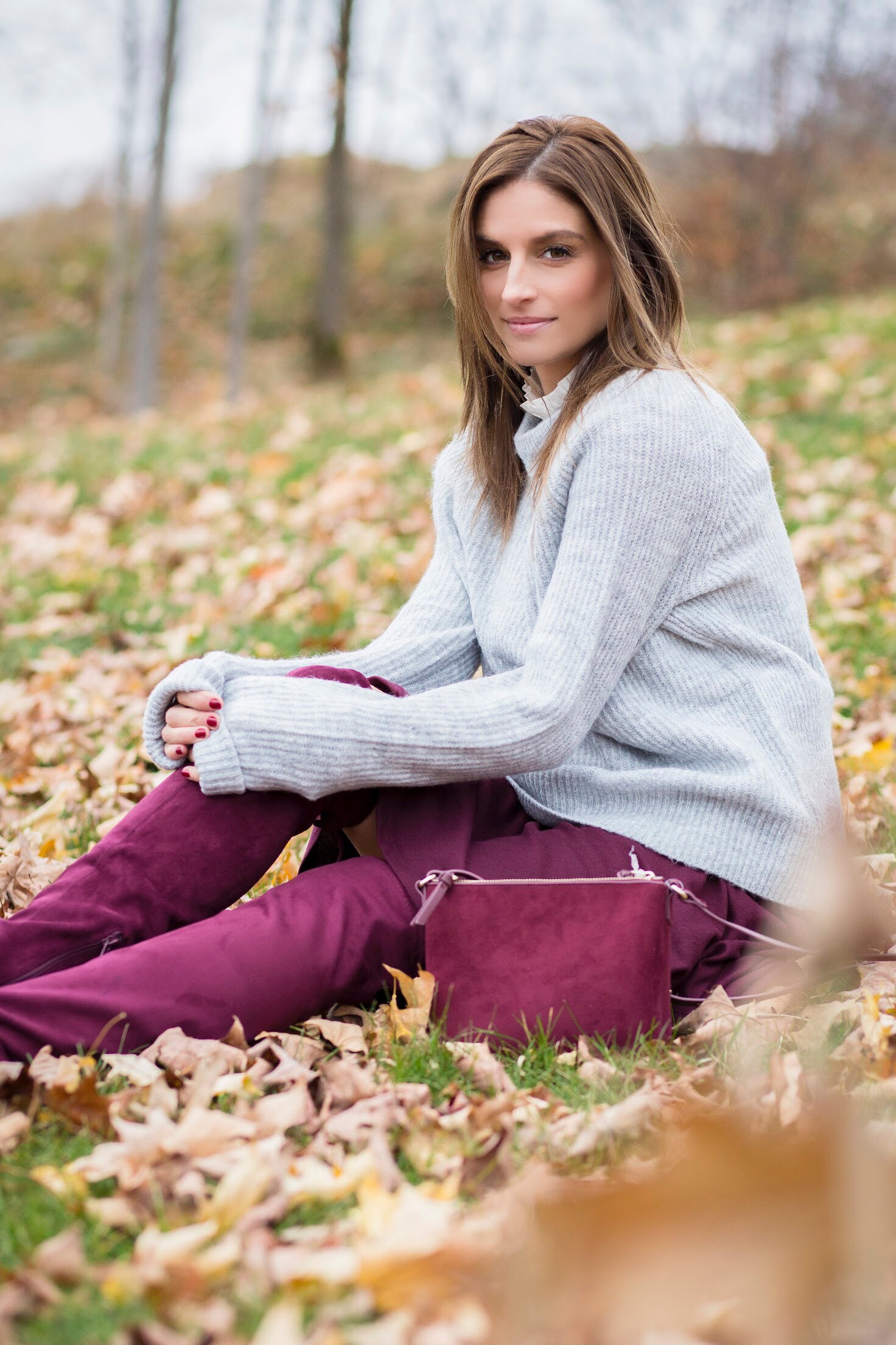 stylish blogger look for the holidays - fall style with burgundy skirt, burgundy over the knee boots, and grey sweater sparkleshinylove mandy furnis
