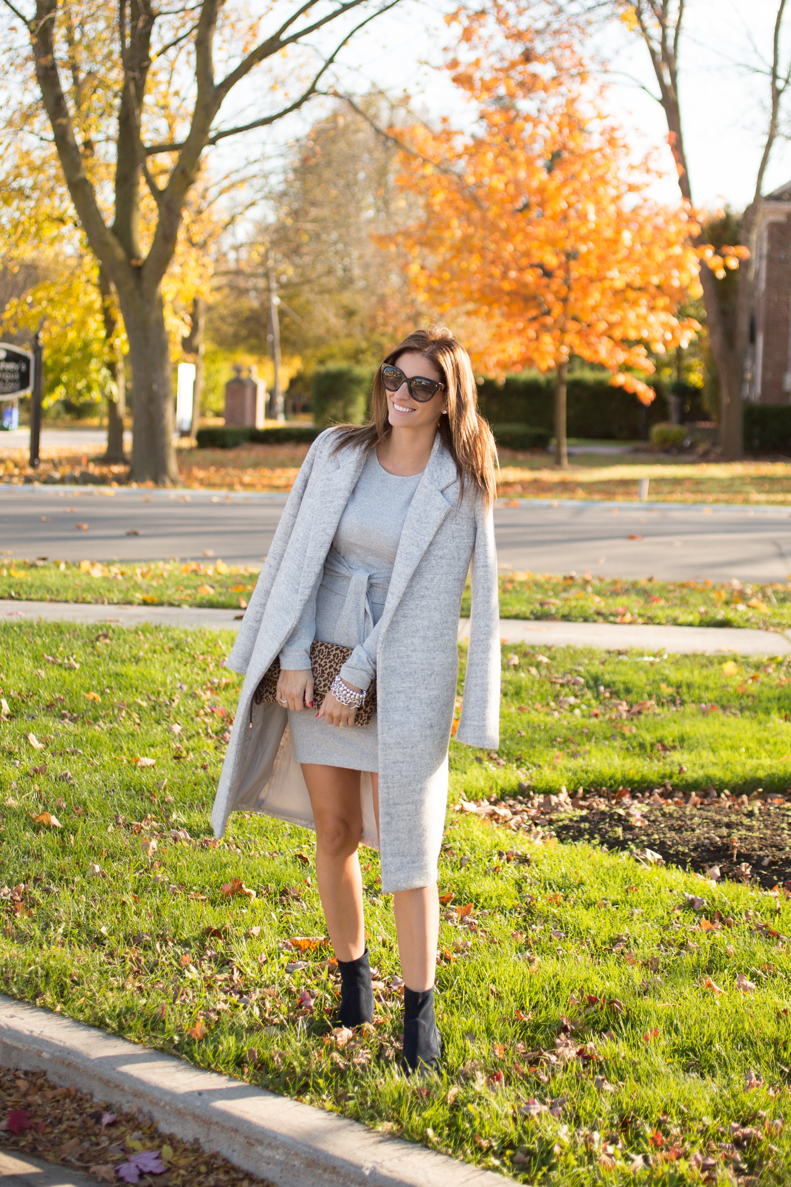 Grey sweater dress from Dynamite, grey long coat, leopard bag, black pointed toe sock boots