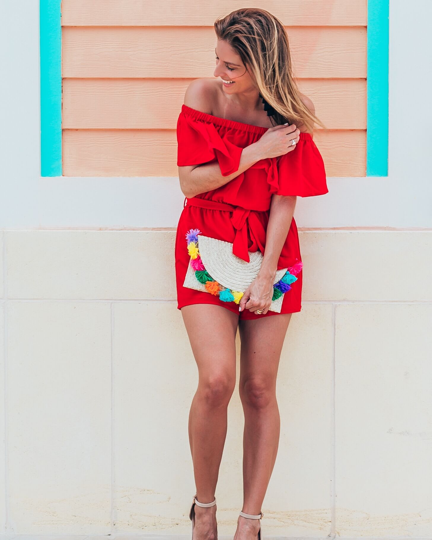 Red romper for summer with tassel clutch and espadrilles what to wear on vacation sparkleshinylove mandy furnis