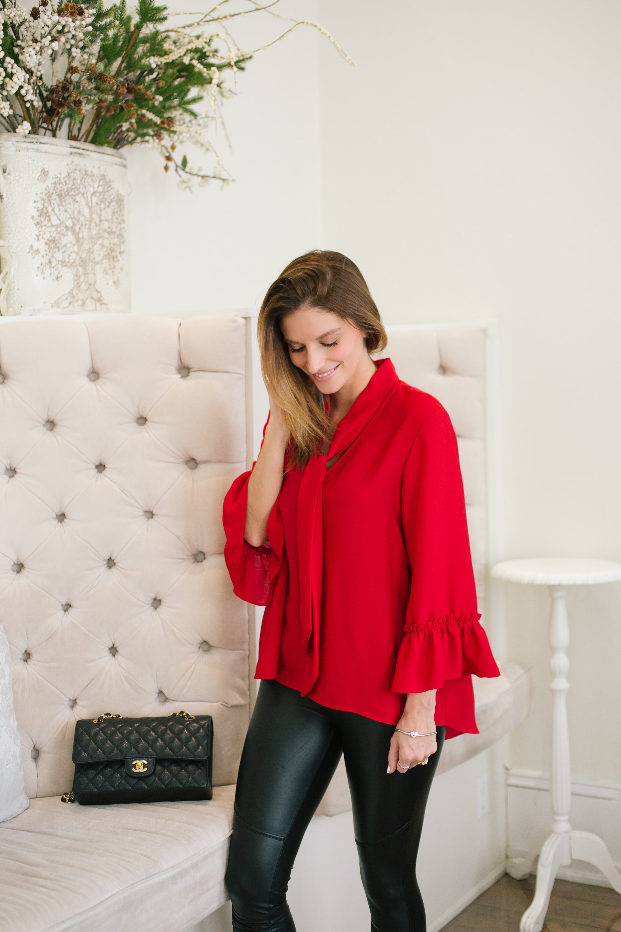 Valentine’s Day date night look with leather leggings and red blouse sparkleshinylove Mandy Furnis