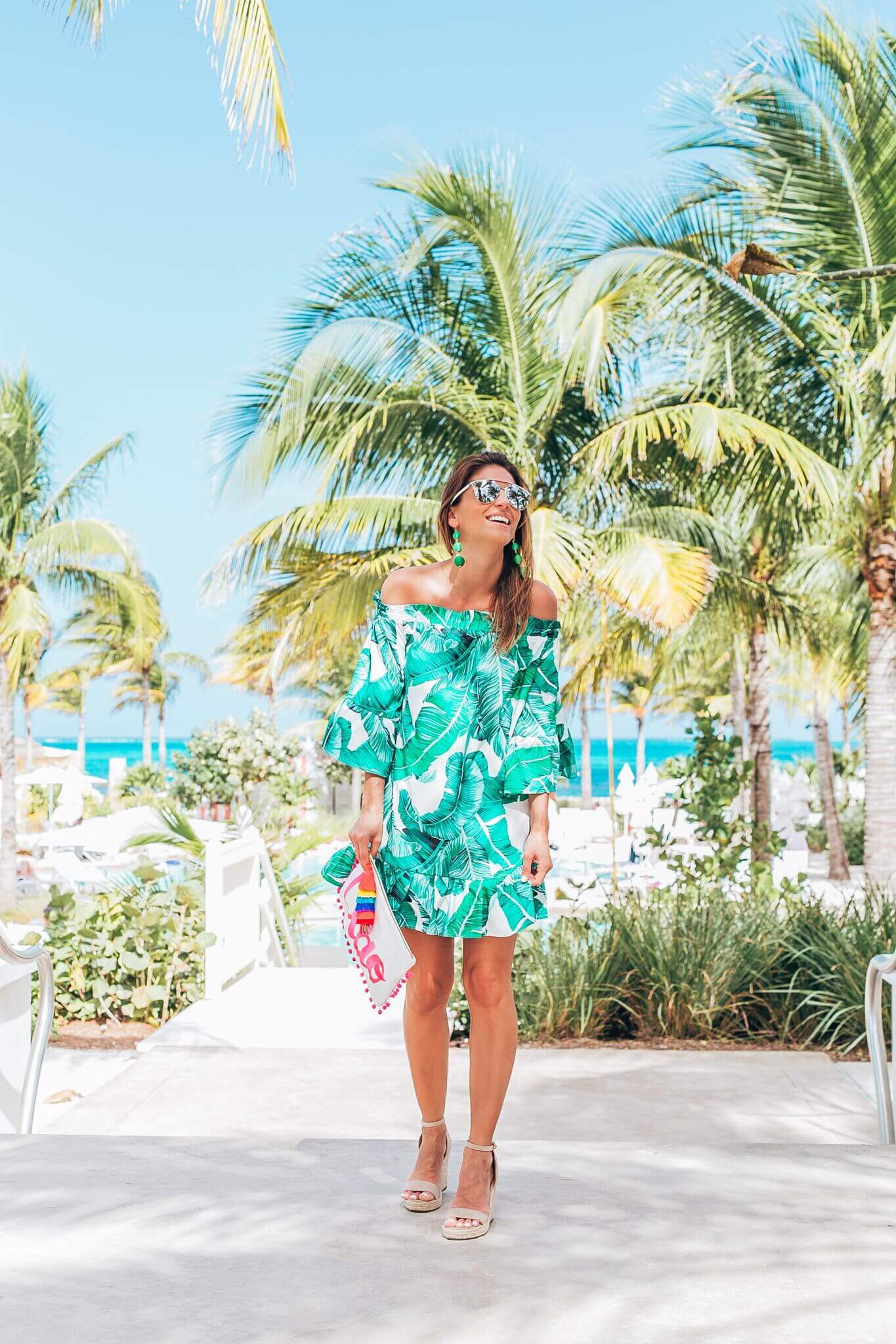 Palm print summer dress, ciao tassel and pom pom clutch, nude espadrilles, green drop earrings, dior so real sunglasses, mandy furnis sparkleshinylove, baha mar resort style