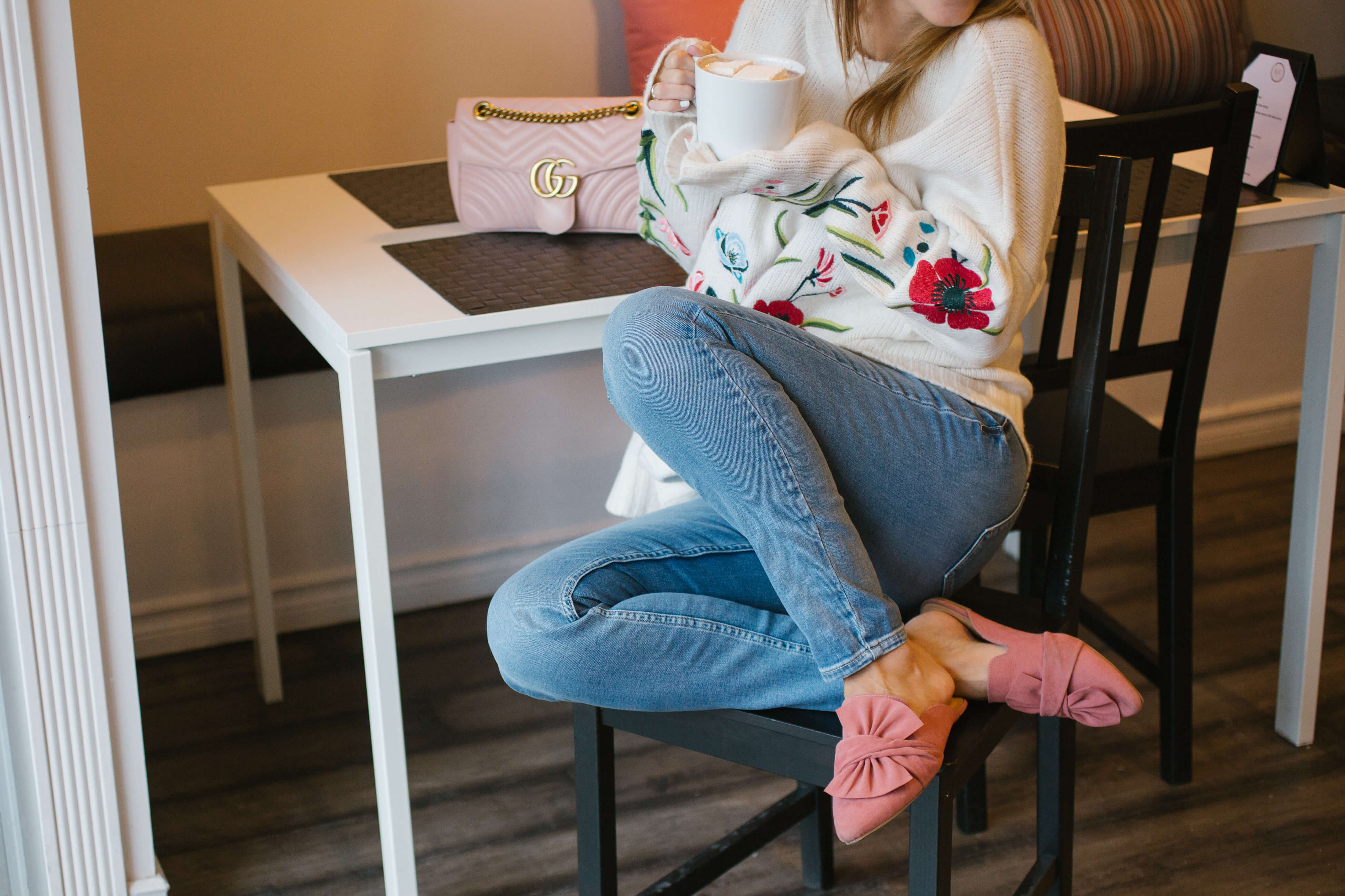 Guess Floral embroidered sweater, guess Low-rise skinny jeans, pink bow slides, pink Gucci Marmount bag sparkleshinylove spring style, M&R Cakes and Cafe