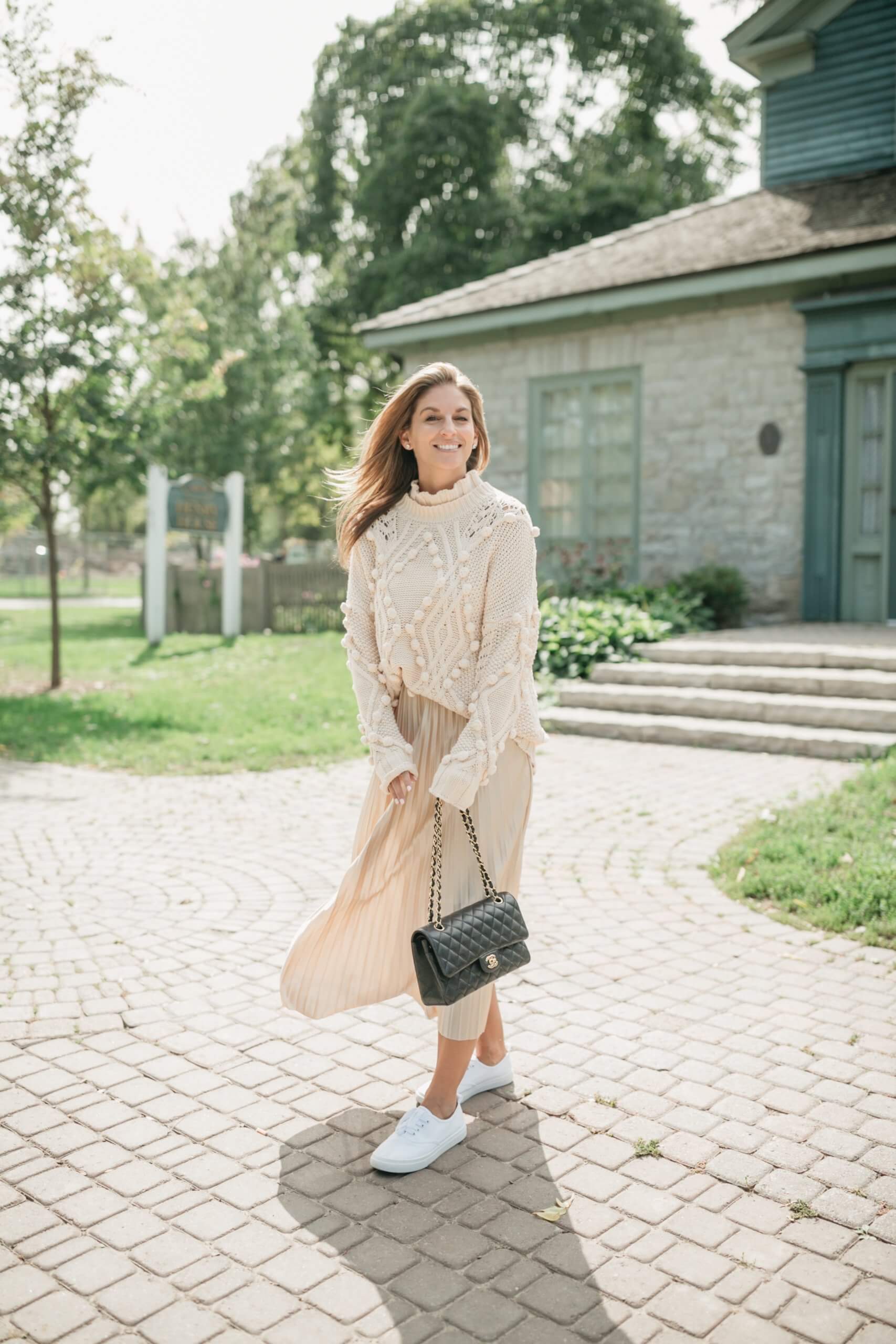 Chicwish HOLLOW OUT POM-POM CABLE KNIT SWEATER IN CREAM; chicwish FULL PLEATED MIDI SKIRT IN CHAMPAGNE; Fall look with maxi skirt; chanel flap bag; sparkleshinylove  
